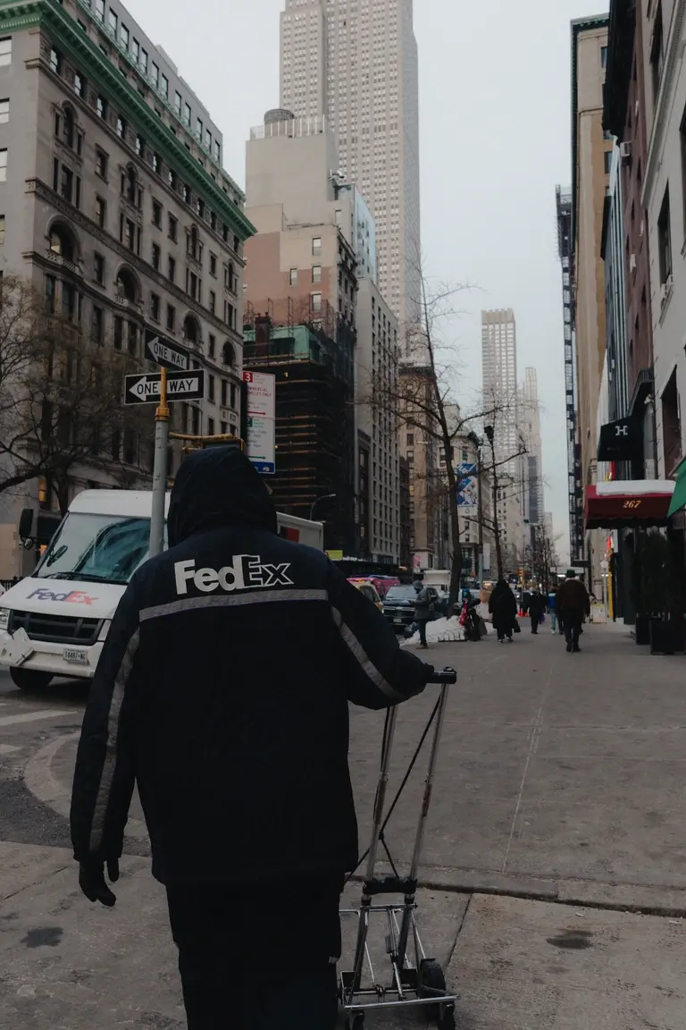 FedEx delivery in busy New York street