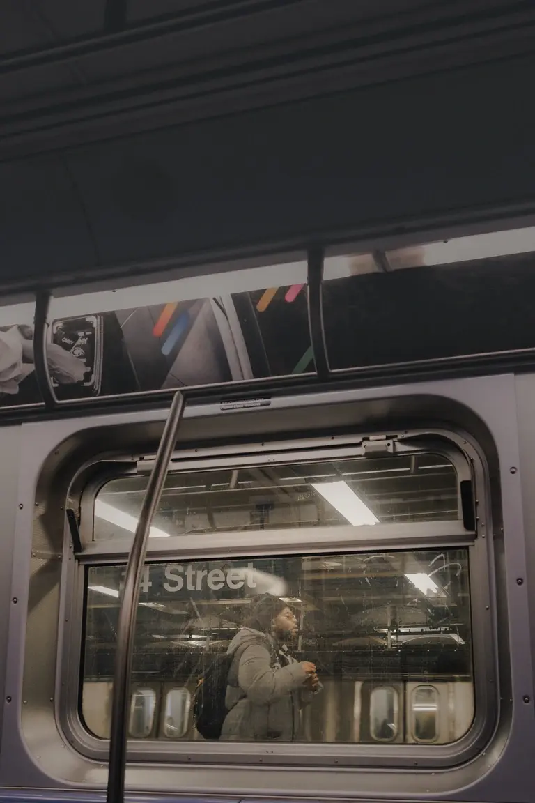 Man walking past subway