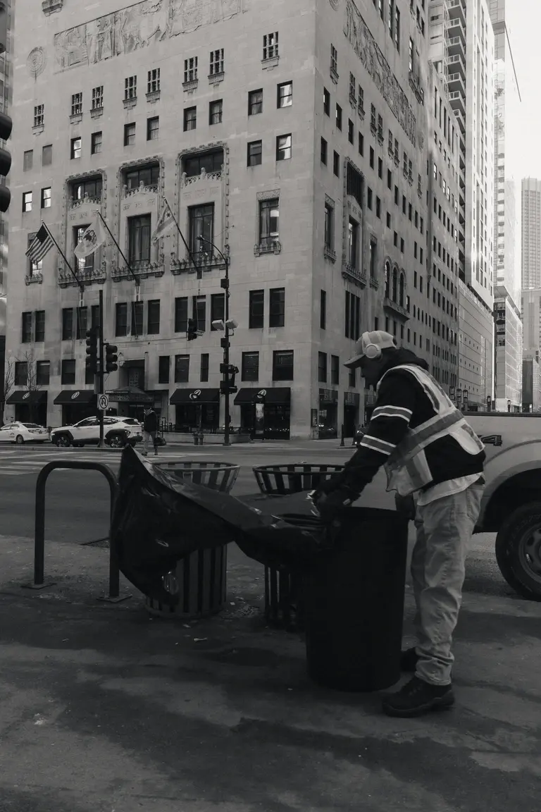 Bin man cleaning streets of Chicago