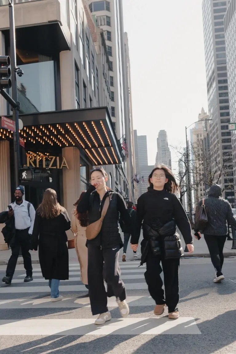 Couple crossing road in Chicago