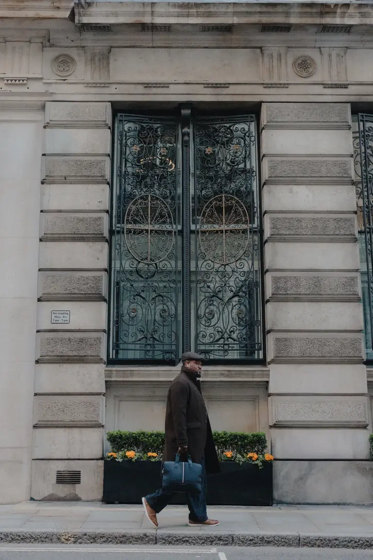 Man walking toward bank junction