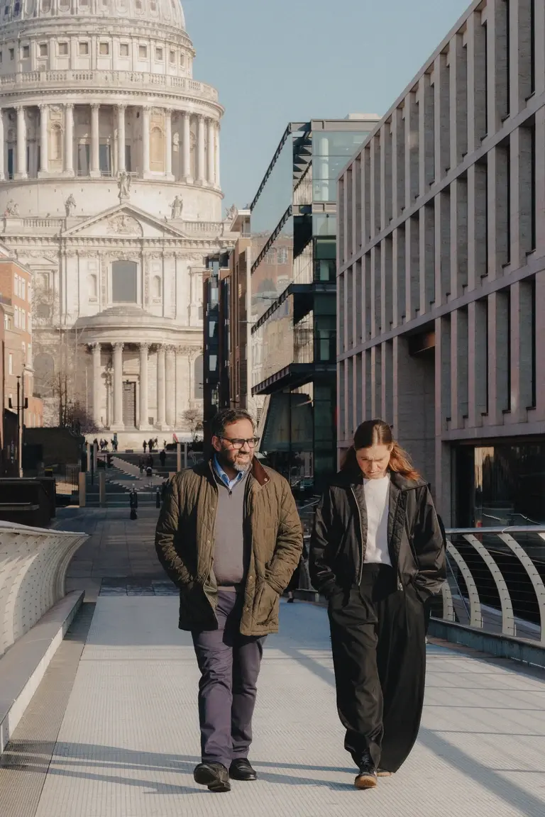 People walking across the Millenium Bridge