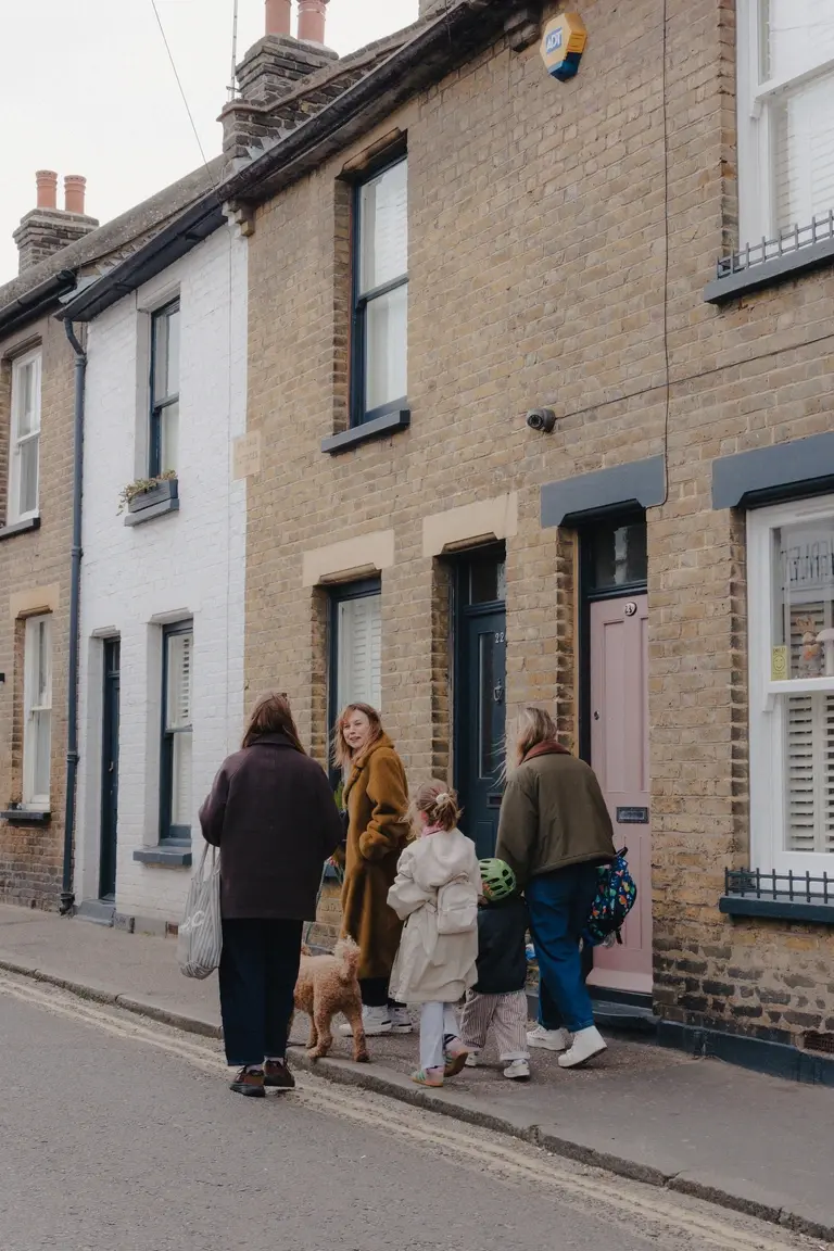 Family walking through Old Leigh streets