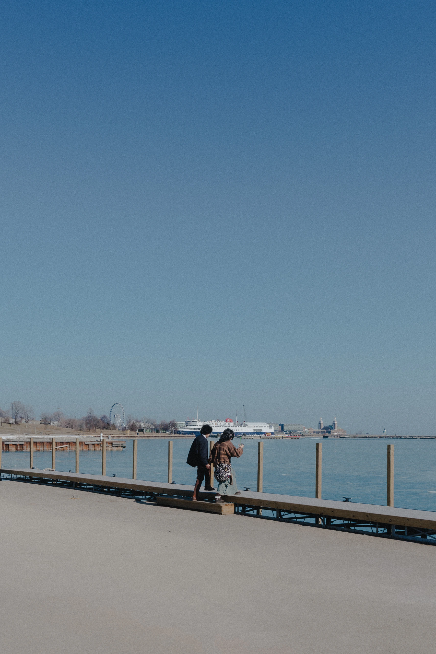 Couple observing Lake Michigan together