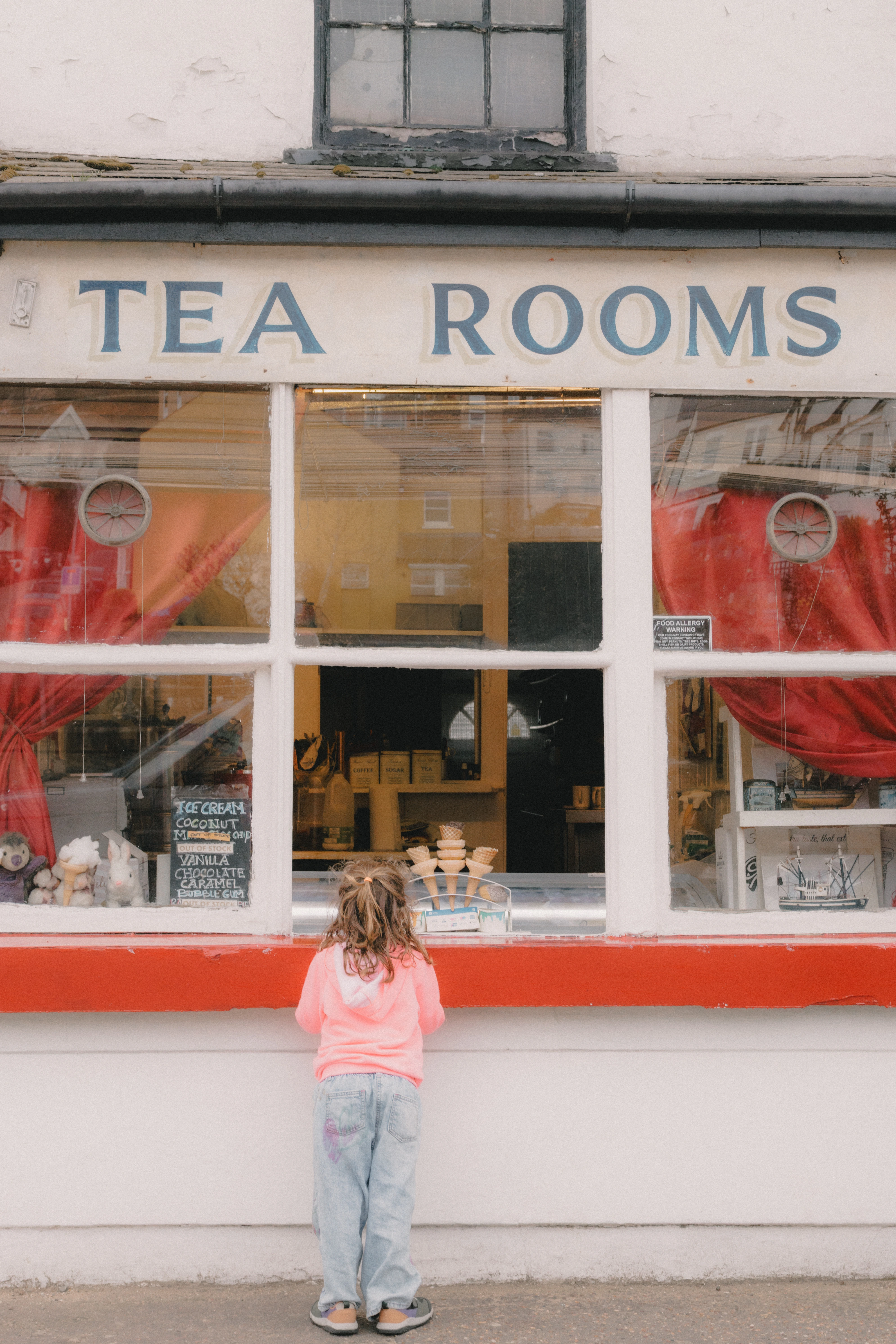 Girl waiting for ice cream in Old Leigh